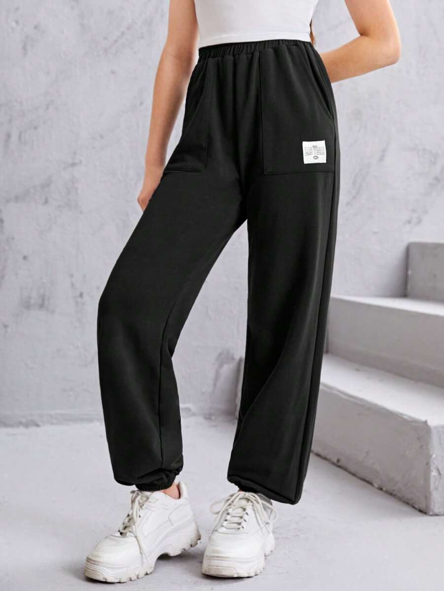 SHEIN Teen Girls Letter Patched Slant Pocket Sweatpants - Black - View 1