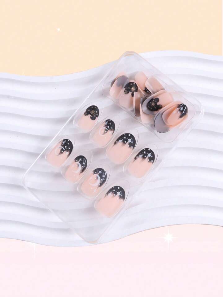 Our 24pcs Short Almond Moon & Star Pattern Fake Nail Kit is such a