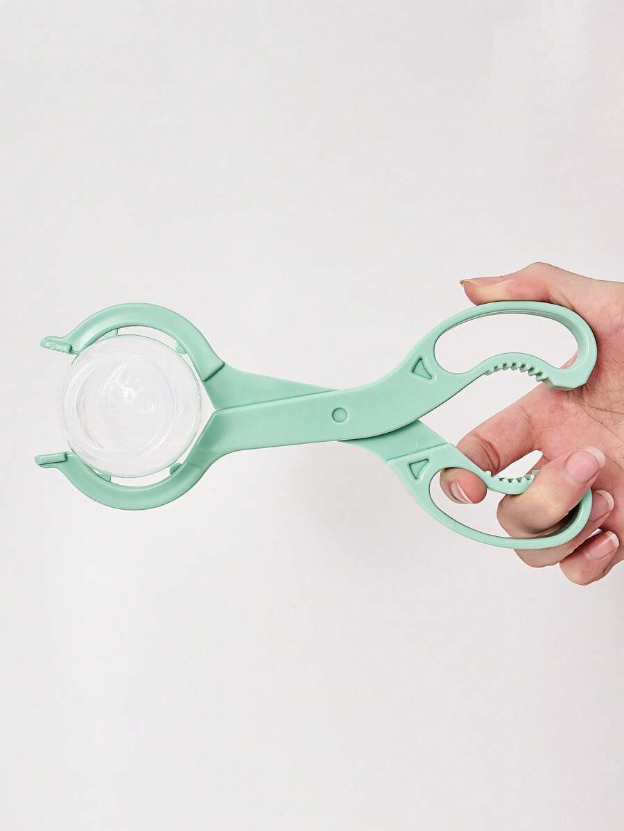 Kẹp bình sữa cho bé - màu xanh lá - Xem 1