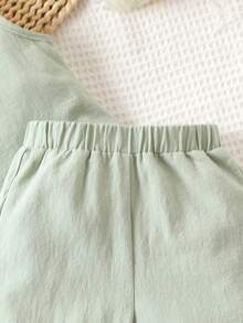 Bộ đồ Em bé Nút màu trơn - Màu xanh Bạc hà - Xem 3