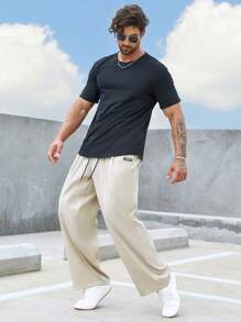 Manfinity Homme 男士寬鬆直筒長褲,採用字母補丁細節設計和束口腰帶 - 米色 - 查看 4