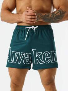 Street Sport Men Letter Graphic Drawstring Waist Slant Pocket Shorts