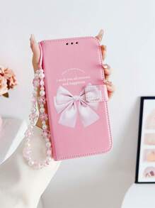 Peach Large Bow Faux Pearl Decor Wristband Case Compatible With IPhone 16, IPhone 16 Pro, IPhone 16 Plus, IPhone 16 Pro Max, Galaxy S25 Ultra, Galaxy S24 Ultra 5G