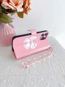 Peach Large Bow Faux Pearl Decor Wristband Case Compatible With IPhone 16, IPhone 16 Pro, IPhone 16 Plus, IPhone 16 Pro Max, Galaxy S25 Ultra, Galaxy S24 Ultra 5G