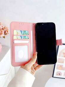 Peach Large Bow Faux Pearl Decor Wristband Case Compatible With IPhone 16, IPhone 16 Pro, IPhone 16 Plus, IPhone 16 Pro Max, Galaxy S25 Ultra, Galaxy S24 Ultra 5G