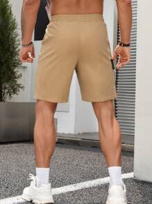 Manfinity Homme Quần Short Nam Dây kéo Đắp vá Túi Khối Màu Đường phố - Màu Khaki - Xem 2