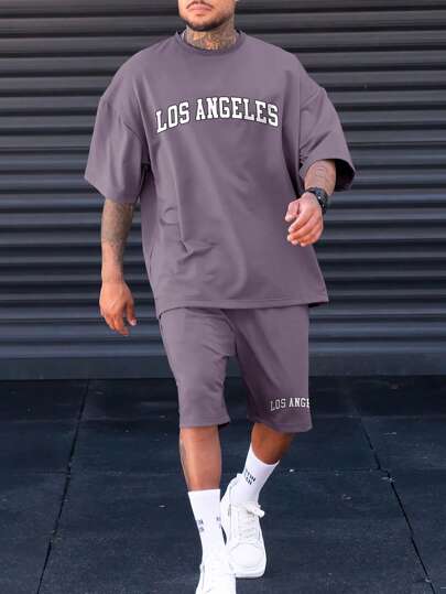 مجموعة تي شيرت رجالي فضفاض مع حروف غرافيك و شورت بخصر الرباط