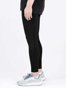 Manfinity Sport Corelite Boyfriend Style Men Solid Sports Tights With Phone Pocket Breathable Sweat-Wicking 4-Way Stretch Material Running Muscle Minimalist Design Slim Fit For Gym Compression Sports Tights