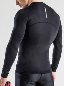 Manfinity Sport Corelite Camiseta deportiva de compresión para hombres con gráfico de letras reflectantes y pespunte - Negro - Ver 3