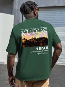 Manfinity EMRG Hombres Camiseta de hombros caídos con estampado de slogan - Verde Oscuro - Ver 1