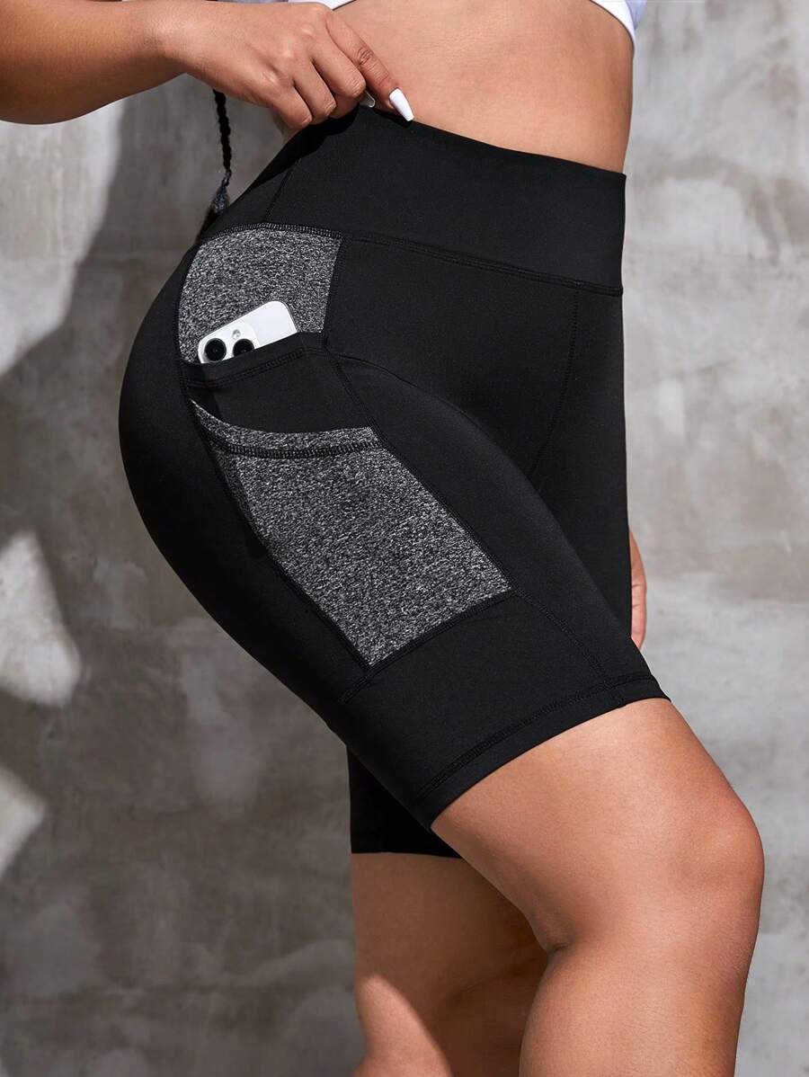 Easithlete Quần short thể thao Plus Size Túi Khối Màu - màu đen - Xem 1