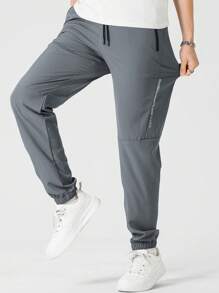 Manfinity Sport Corelite Men Letter Graphic Drawstring Waist Slant Pocket Sports Trousers - Grey - View 1