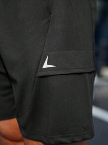 Manfinity Fitness Shorts deportivos para gimnasio para hombre con bolsillos inclinados y cintura elástica con cordón - Negro - Ver 8