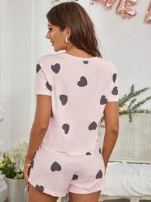 Conjunto de pijama con camiseta y pantalones cortos con estampado de corazón