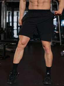 Manfinity Sport Corelite Pantaloni scurți sport 2 în 1 pentru bărbați în stil Boyfriend, cu bandă reflectorizante, cu buzunar pentru telefon