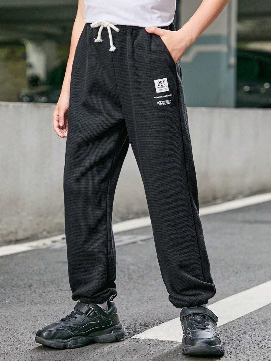 SHEIN Tween Boy Letter Graphic Drawstring Waist Sweatpants