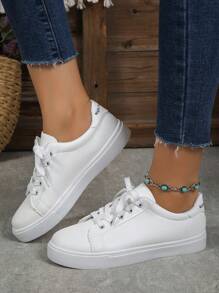 女式平底系带学院风白色休闲帆布运动鞋