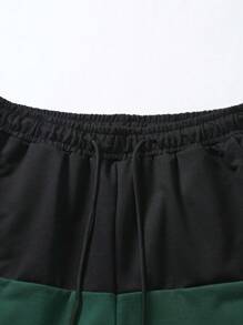 Manfinity Homme Quần short nam dáng rộng màu khối có dây rút ở eo và họa tiết chắp vá - Nhiều màu - Xem 5