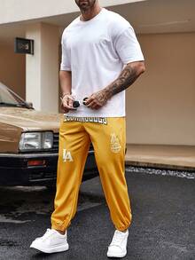 Manfinity EMRG Pantalones De Chándal Sueltos De Cintura Con Cordón Y Letras Gráficas Para Hombres - Amarillo - Ver 6