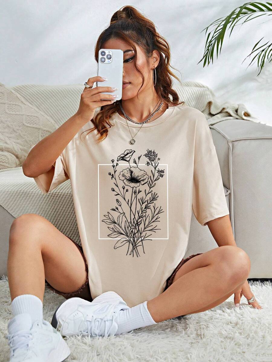 INAWLY Camiseta de mujer con estampado floral, hombros caídos y gráfico - Albaricoque - Ver 1