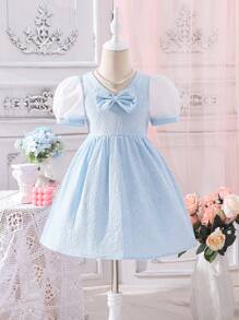 小女童前蝴蝶結泡泡袖洋裝