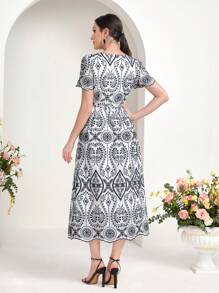 Modelyn Allover Print Notched Neckline Puff Sleeve Dress - Black and White - View 2