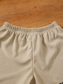 SHEIN Da Bambini Maglietta & Pantaloncini con grafica slogan con tasca a marsupio 2 in 1 con cappuccio