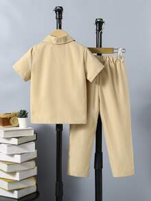 小男童標語圖案襯衫和褲子和背心上衣