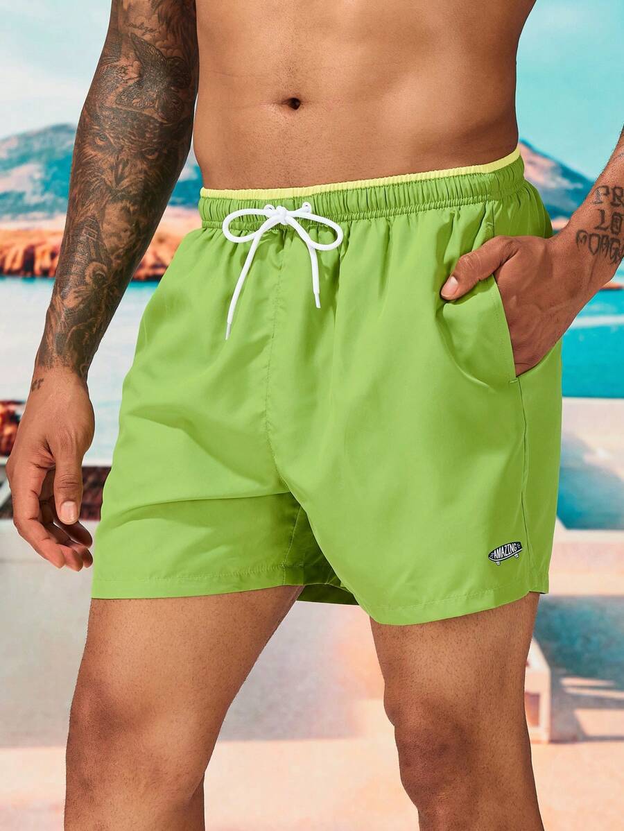 Manfinity Swimmode Quần short nam đi biển Dây kéo Túi Lá thư - màu xanh lá - Xem 1
