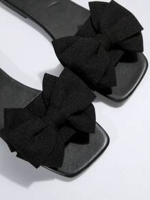 Tropiscape 蝴蝶结拖鞋 女士拖鞋 时尚凉鞋 防滑蝴蝶结户外鞋 适合约会、购物、度假、海滩、娱乐 营造度假氛围 放松海滩 秋季 圣诞节 冬季 圣诞礼物 - 黑色 - 查看 10