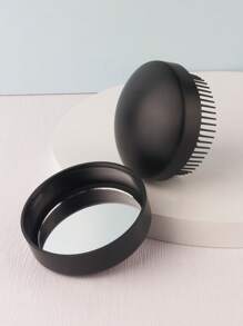 Peine portátil con espejo