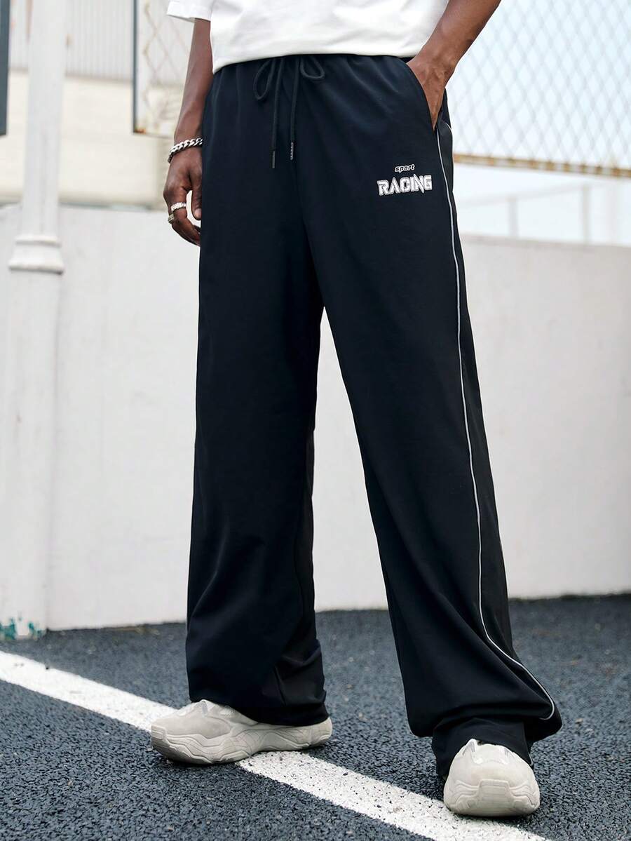 Manfinity RebelGame 男士字母圖案拼接滾邊腰部抽繩長褲 - 黑色 - 查看 1