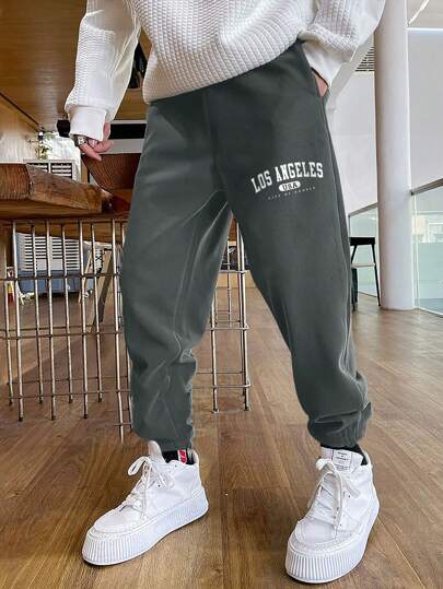 Pantalones de chándal holgados con estampado de letras para hombres