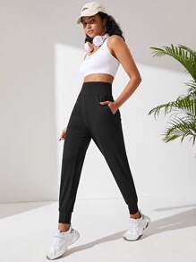SHEIN Sport Studio Pantalones deportivos unicolor con bolsillo oblicuo