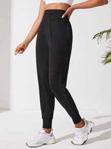 SHEIN Sport Studio Pantalones deportivos unicolor con bolsillo oblicuo