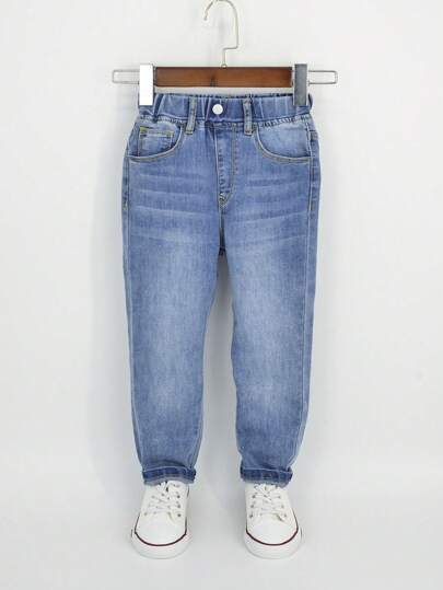 بنطلون جينز صبياني بجيوب مائلة و تصميم الجزرة