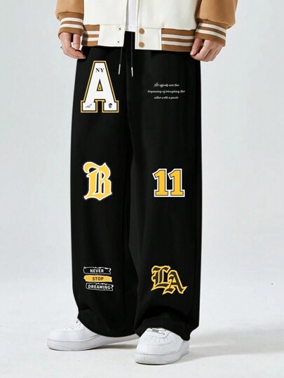 Pantalones de chándal holgados para hombres con cordón en la cintura y eslogan gráfico