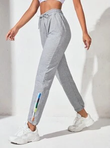 Quần Thể thao Nữ Dây kéo Túi Sọc bên Lá thư - Màu Xám nhạt - Xem 1