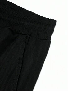 Manfinity Homme Quần Short Nam Dây kéo Túi Ruy băng Khối Màu Giải trí - màu đen - Xem 3