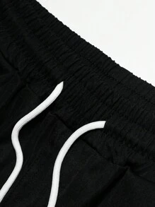 Manfinity Homme Quần Short Nam Dây kéo Túi Ruy băng Khối Màu Giải trí - màu đen - Xem 6