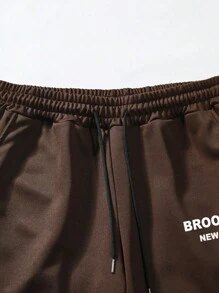 Manfinity Homme Lỏng lẻo phù hợp Nam Đồ họa Chữ cái Eo dây rút Quần thể thao - Cà phê nâu - Xem 5