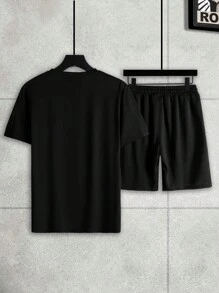 Manfinity Homme Conjunto de camiseta y pantalones cortos de ajuste holgado de unicolor con hombros caídos para hombres, atuendo cómodo - Negro - Ver 2