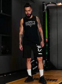 Manfinity Sport Corelite 男友风男士字母图案抽绳腰运动短裤健身短裤