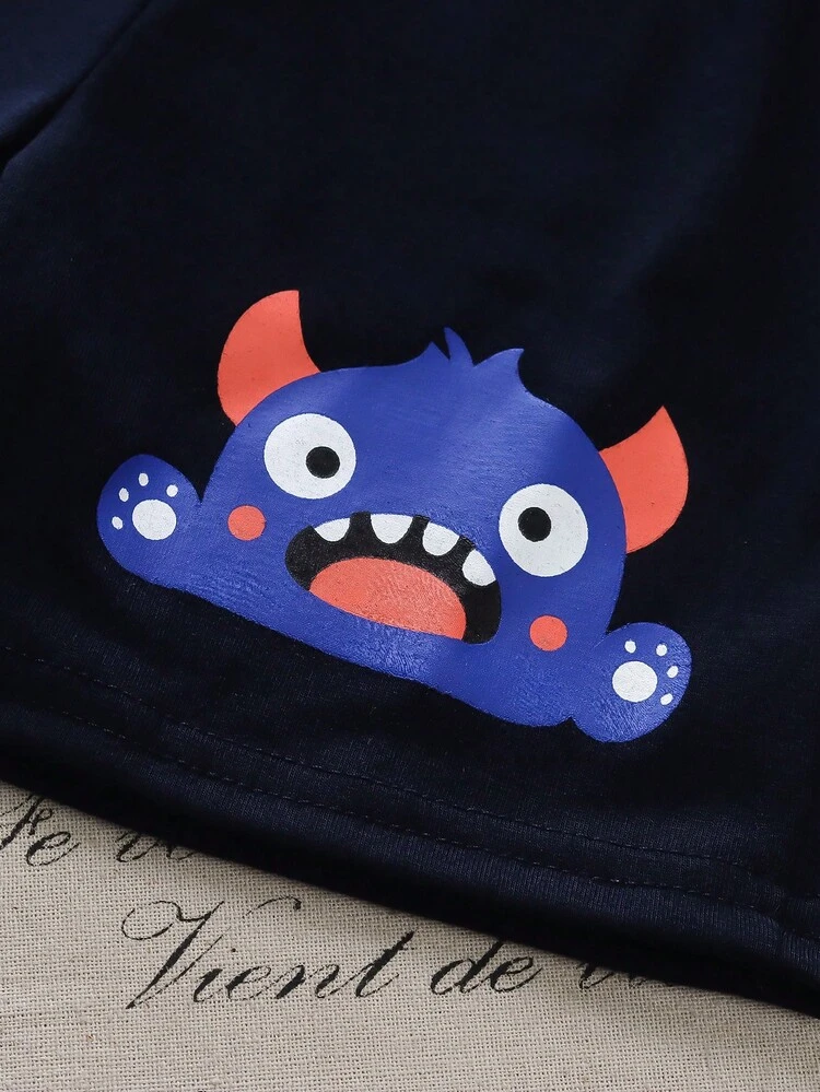 Young Boy Cartoon Graphic Tee & Shorts