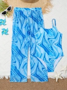 Chica preadolescente Bañador una pieza fluido con estampado con pantalones cover up