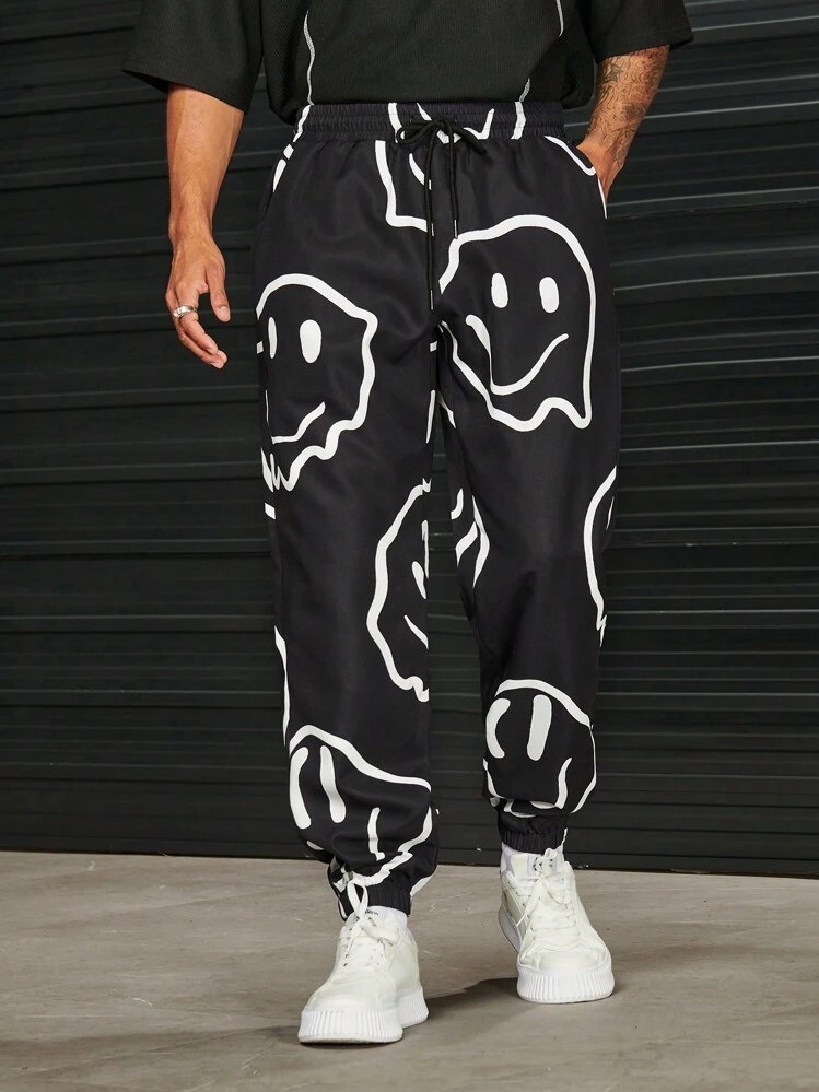 Manfinity RebelGame Men Cartoon Graphic Drawstring Waist Pants - Black and White - View 1