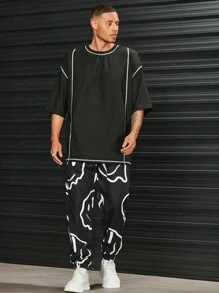 Manfinity RebelGame 男士卡通圖案腰部抽繩長褲 - 黑與白 - 查看 3