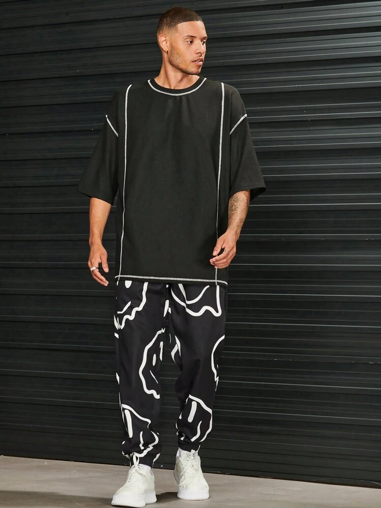 Manfinity RebelGame Men Cartoon Graphic Drawstring Waist Pants - Black and White - View 3