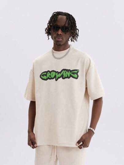 Uomo Maglietta con spalla cadenti con grafica lettera