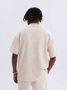 Uomo Maglietta con spalla cadenti con grafica lettera